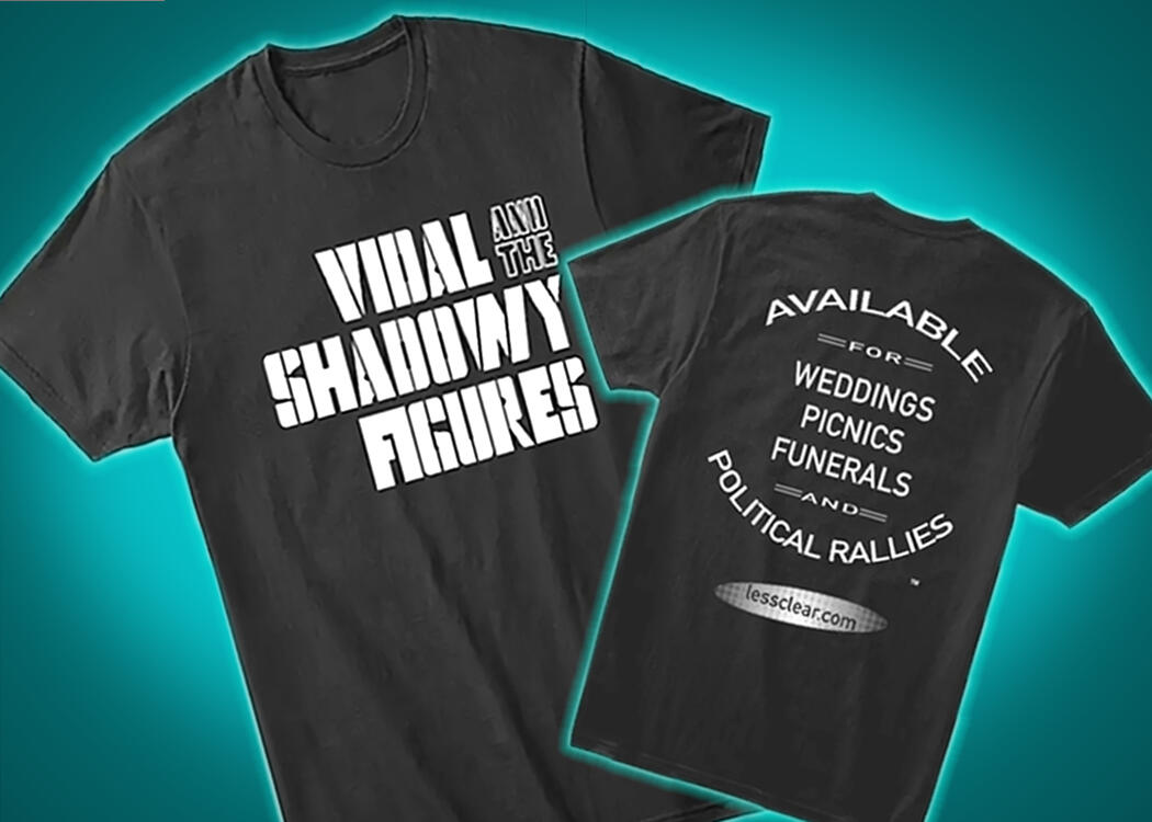 Vidal and the Shadowy Figures Local Gigs and logo t-shirt Step into the underground mythos of Vidal and the Shadowy Figures with the classic logo T-shirt. On the back: an irresistible whisper of rebellion: ‘Available for weddings, picnics, funerals, and political rallies.’ An invitation—or perhaps a warning.